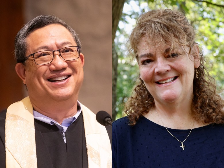 A man on the left in a clergy robe and glasses smiles, and on the right a woman with curly hair and a cross on her necklace smiles, with greenery behind her.
