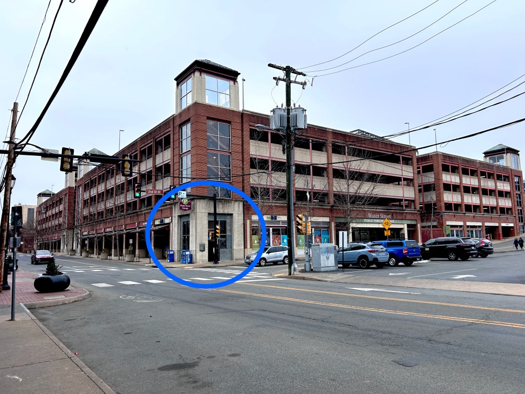The blue circle shows the location of the payment kiosk for the Water Street garage, on the ground floor of the garage building at the intersection of Water and Second streets.